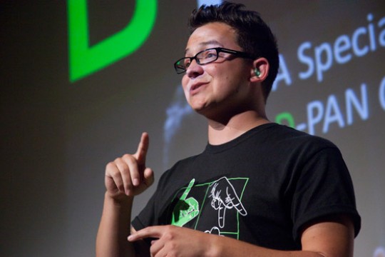 Photo of Sean Forbes on stage.