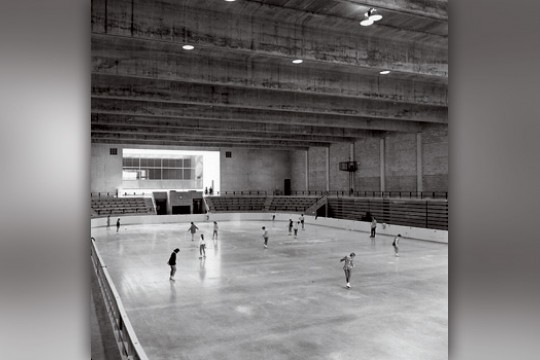 People skating in ice rink