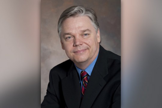 Professor posing for camera