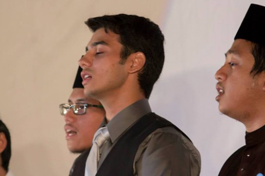 People singing on stage