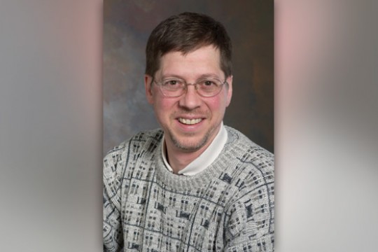 A headshot of Bill Stackpole.