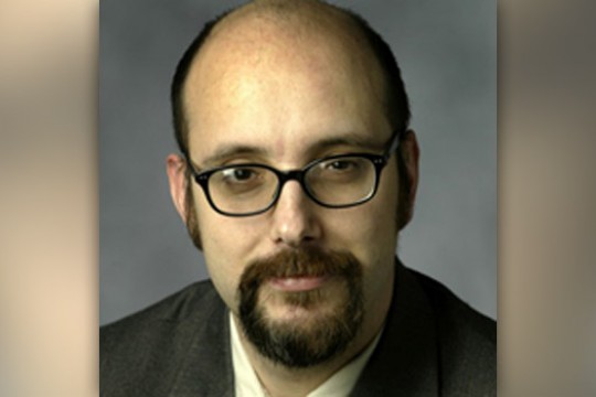 Professor posing for camera