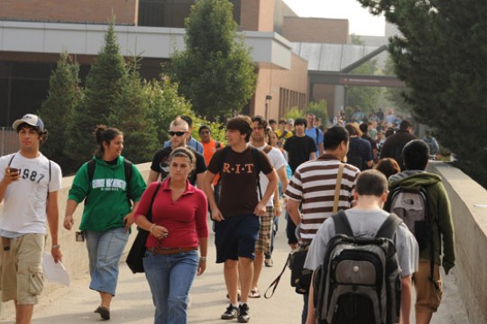 People walking down path