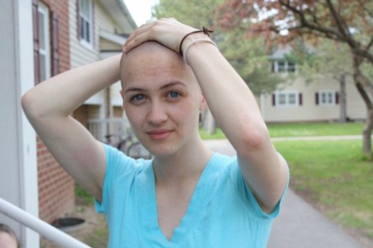 Student posing outside