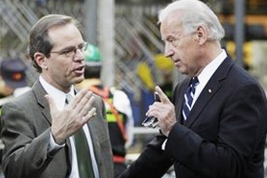 Two people talking at construction site