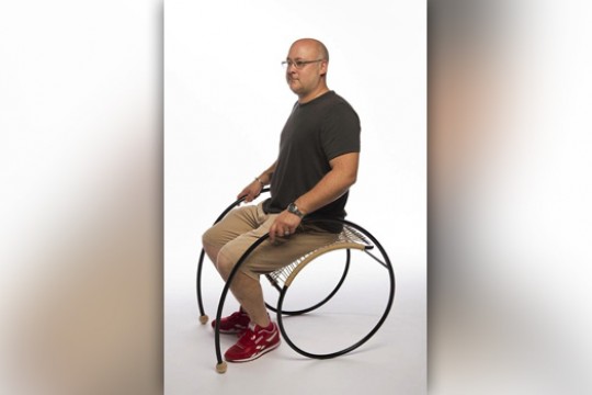 Person sitting on art wheelcahir