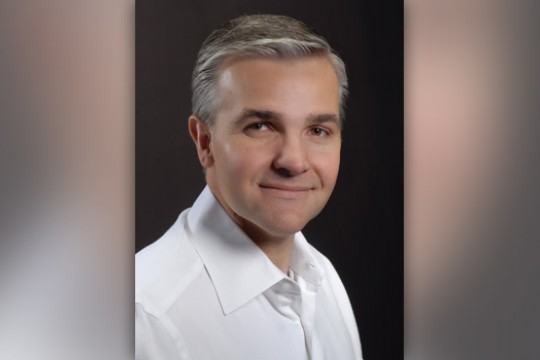 Professor posing for camera