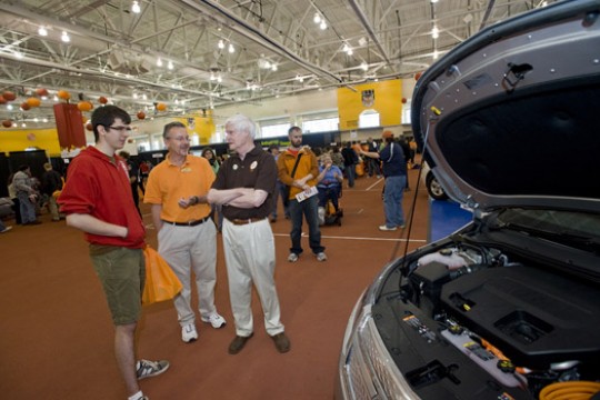 People posing for camera at event