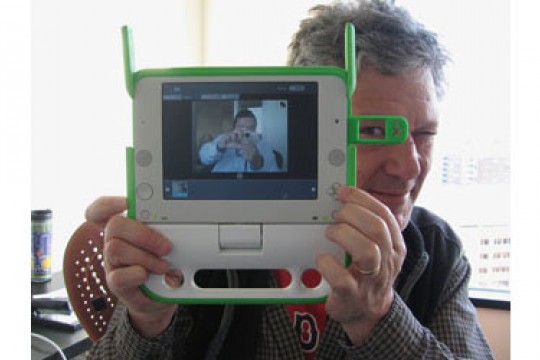 Person displaying camera device