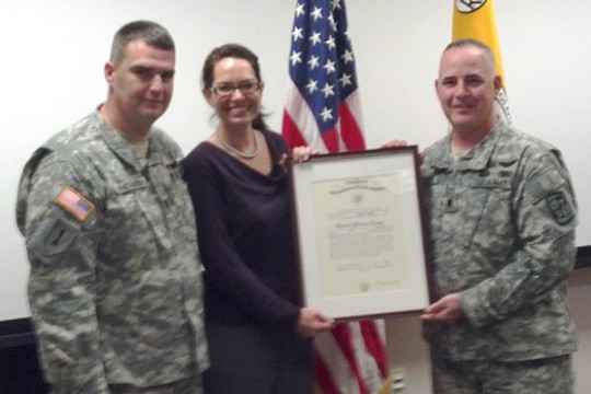 Military people posing for camera