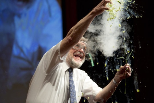 Scientist performing on stage