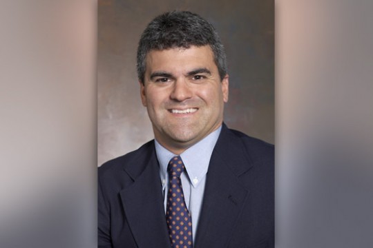 Professor posing for camera