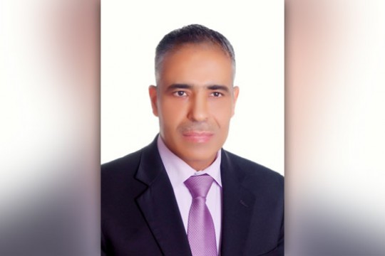 Professor posing for camera