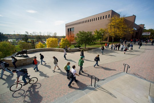 An aerial view of students walking down the quarter mile on RIT's Henrietta campus.