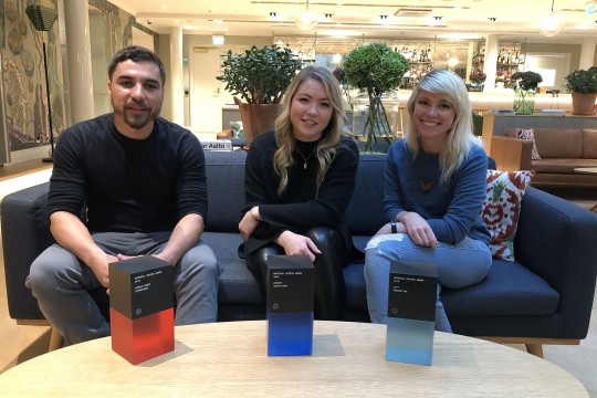 From left, new media design alumni with Google Material Design Awards in Helsinki, Finland: Valentin Drown '11, Emmi Hintz '12 and Linzi Berry '09