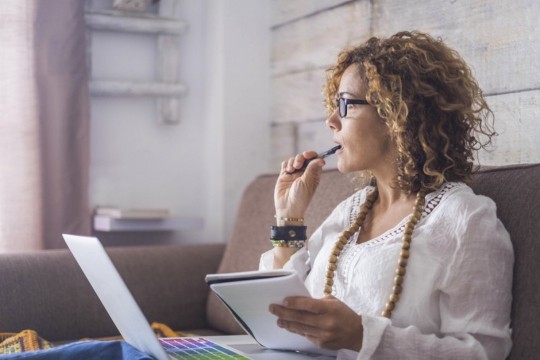 Woman doing work on a laptop
