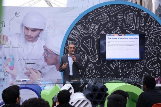 Man delivers presentation.