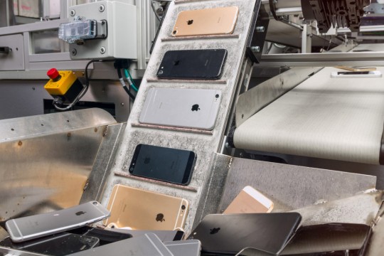 Iphones on converyor belt.