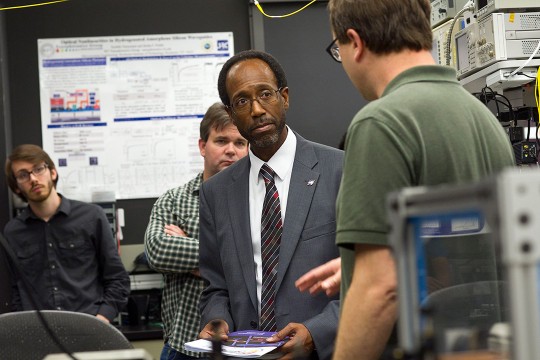 Men tour Center for Detectors.