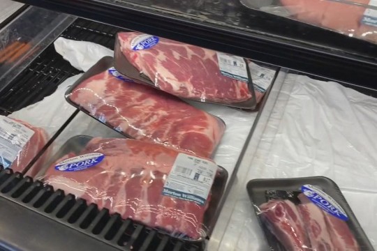 packages of pork in a grocery store.
