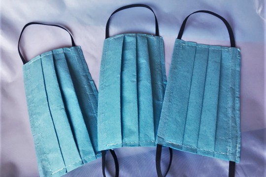 three surgical face masks.