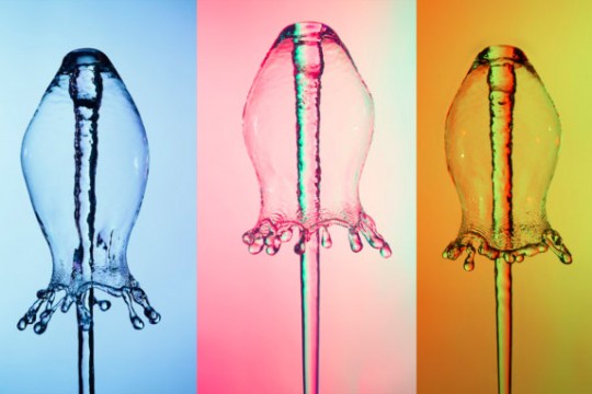 three images of spout of water falling down on itself to make a bell shape.