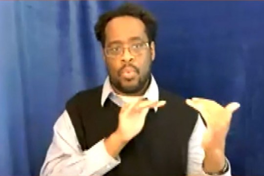 professor using sign language.