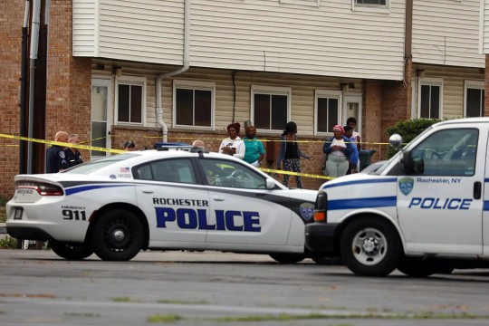 Rochester police cars blocking an intersection.