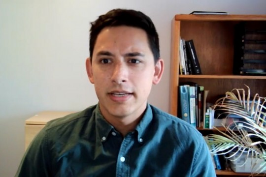 screenshot of professor talking for a news segment.