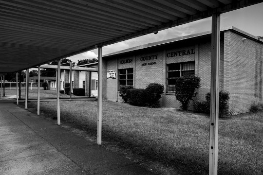 black and white image of a school building.