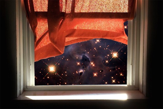 illustration of galaxies in space outside a bedroom window.