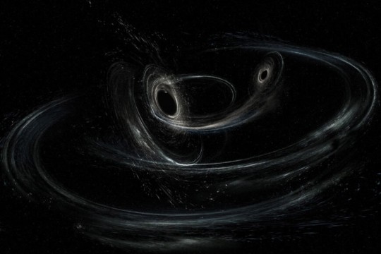 illustration of two black holes spiral around each another before coalescing into one.