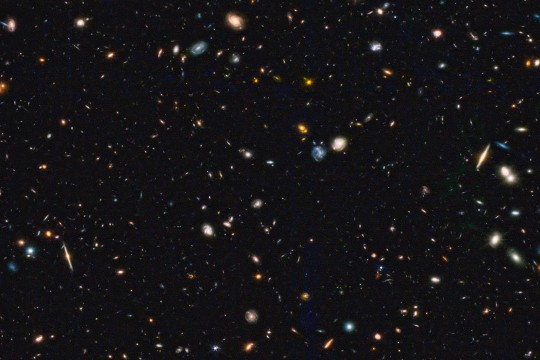 An image of many tiny, distant galaxies taken by the James Webb Space Telescope
