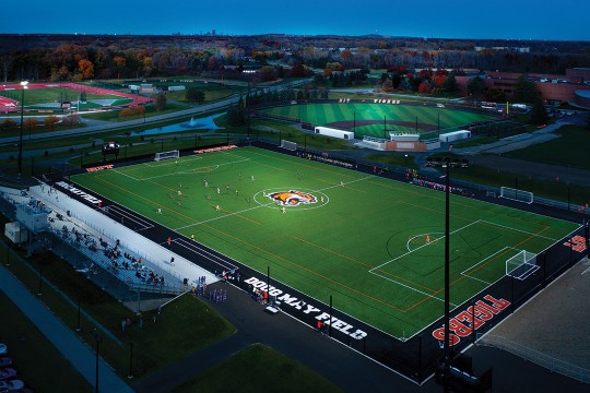 aerial view of a soccer field, baseball diamond and track and field complex.