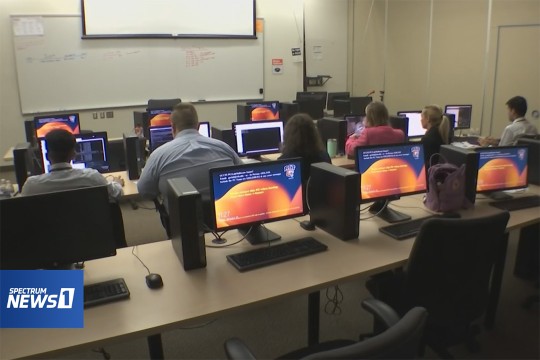 college students working in a computer lab.