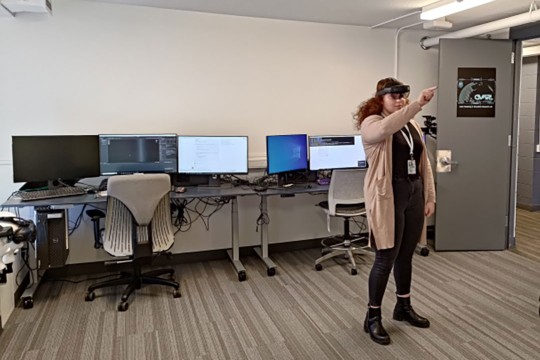 Photo of student working with virtual world application