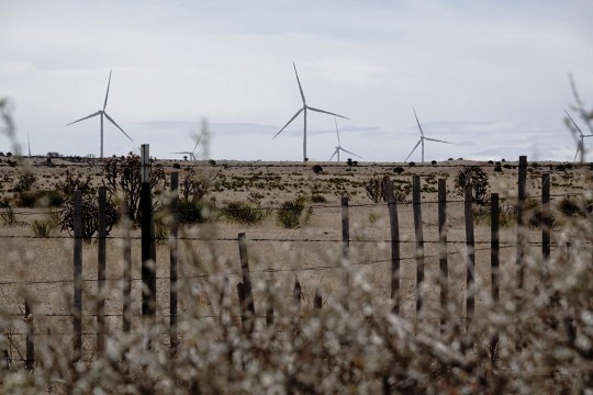 windmills in a desert location.