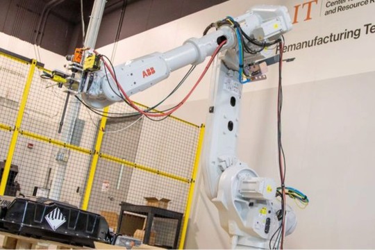 a piece of equipment in the R I T remanufacturing lab is shown.