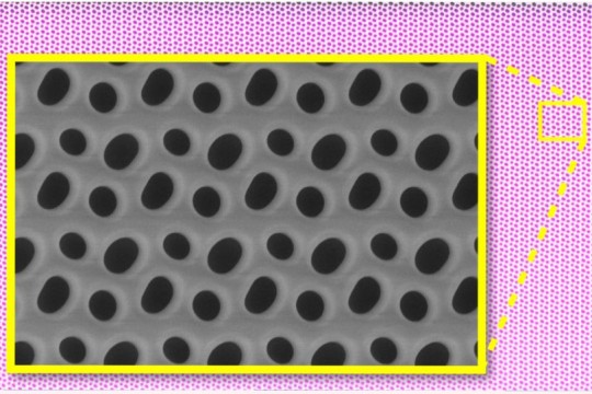The graphic shows a section of a laser sail on a microscopic level. In the background, you see the sail full of small pink dots. There is a yellow square outlining one small section of the pink sail, and a larger yellow square containing the microscopic view of the sail. The microscopic image is black and gray.
