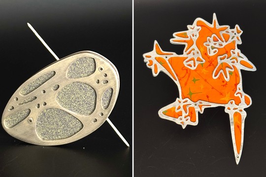 A pair of brooches designed by Cece Plympton.