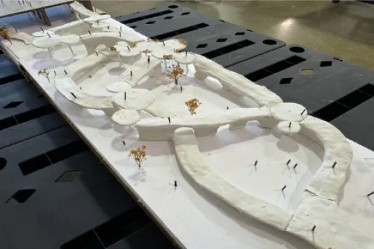 A model of a public space celebrating the preservation of Broad Street Bridge and graffiti walls.