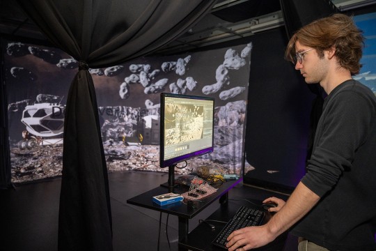 Tommy Desjardins works in RIT's Simulation Lab.