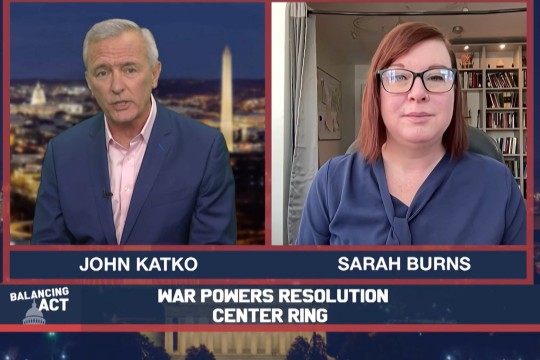 two people appear on TV in boxes next to each other.