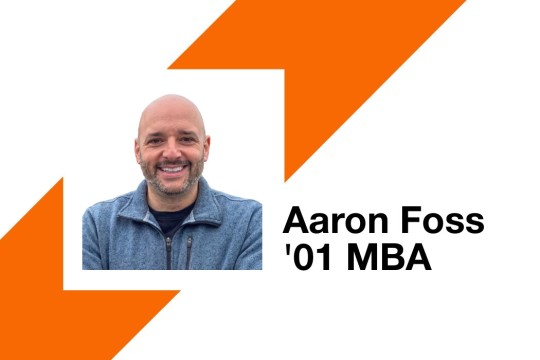 a headshot of a man in a blue sweater next to the words Aaron Foss 0 1 M B A