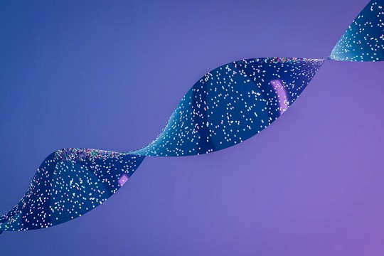 Illustration of twisting ribbon composed of digital particles against a purple-blue gradient backdrop