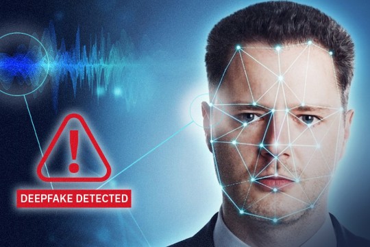 A man with CGI prisims on his face with a sign indicating that a deepfake has been detected!