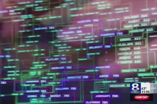 Computer screen showing green and blue lines of code.