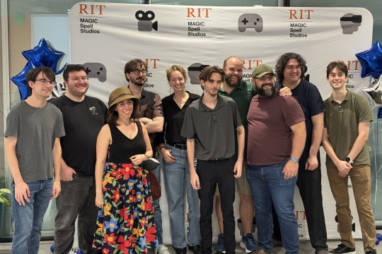 The MAW Team celebrates the launch of their finished game.