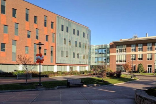 buildings on the R I T c ampus are shown in a sunny day