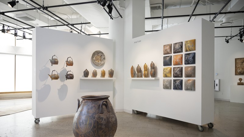 A gallery installation view of pottery made by Andy Foster.